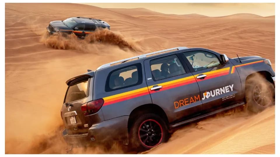 Dubai Desert Discovery: Red Dunes Safari, Sandboard & Camel Ride - Image 1